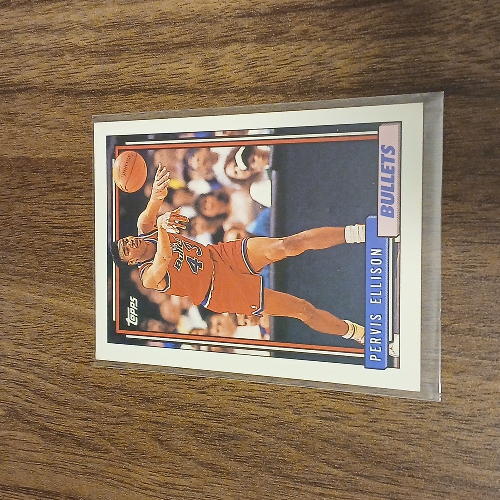 Purvis Ellison bullets 2.5 in by 3.5 in yellow blue red white basketball card